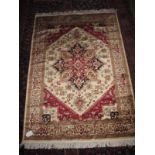 Beige ground Heriz motif rug (1.90 c 1.