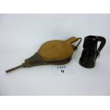 A pair of oak fire bellows and a leather 'jack' jug est: £30-£50 (A3)