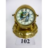 A good quality brass reproduction novelty clock after the Bradley Hubbard Barber Shop clock (c.