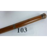 A vintage beech and copper capped tippling stick, bottle in handle,