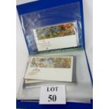 A collection of stamps and first day covers in an album 1984 Maidstone Sorting Office which were