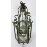 An antiqued metal and glass hexagonal hall lantern est: £40-£60 (E)