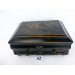 An oriental black lacquered box with cockerels in a tree decoration in gilt and colours,