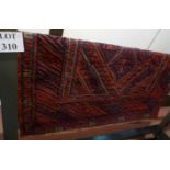 Tribal Gazak rug (111 x 118 approx) est: £45-£55