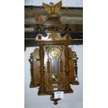 A continental walnut regulator with eagle pediment (key with auctioneer) est: £80-£120 (C)