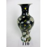 A Chinese baluster vase decorated with birds and blossom on a black ground est: £80-£120 (B6)