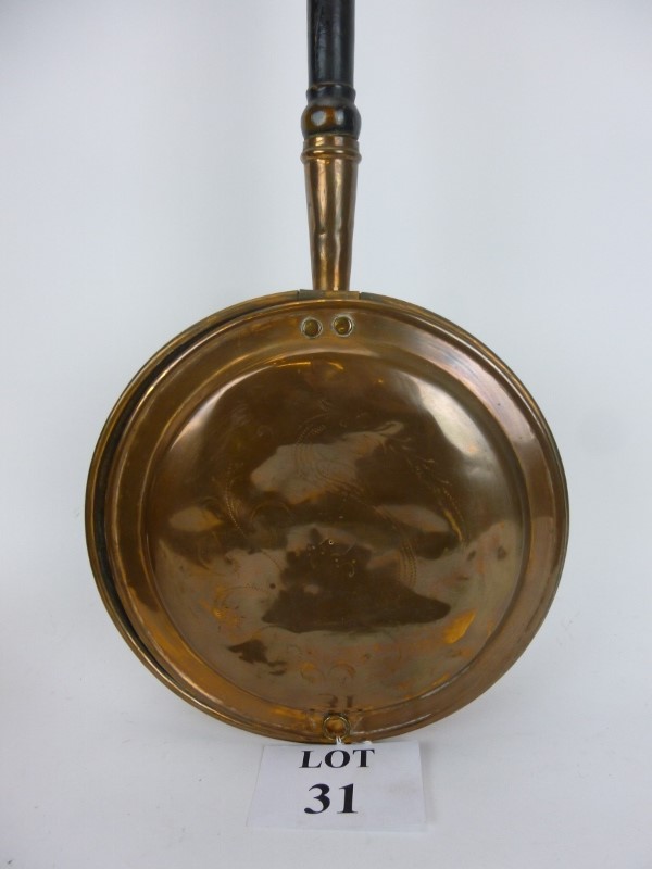 An early 19th century copper warming pan est: £25-£45 (C)