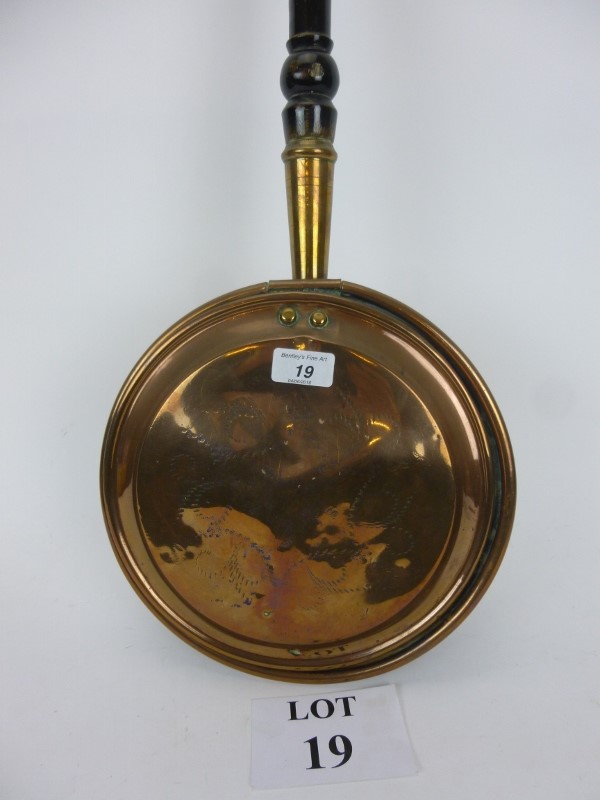 An early 19th century copper warming pan est: £25-£45 (C)