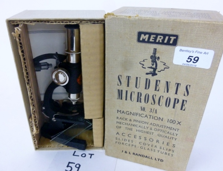 A student's Merit microscope J & L Randall No 3/4 in original box est: £25-£45 (B21)