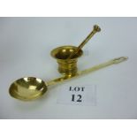 A 19th century brass ladle;