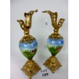 A pair of decorative gilt mounted vases decorated with hunting scenes est: £50-£80 (AB6)