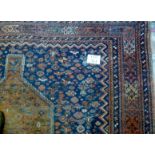 An early 20c Persian carpet on blue ground (300 x 220 cm approx) est: £150-£250