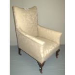 A c1900 armchair upholstered in cream da