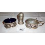 A three piece silver condiment set with
