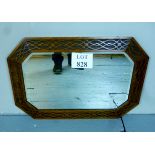 An early mid 20c oak carved wall mirror