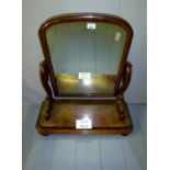 A Victorian mahogany table top swing mir