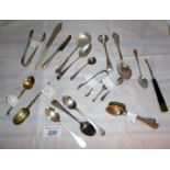 A collection of mainly silver spoons est