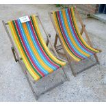 A pair of stripe children's deck chairs