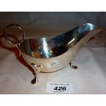 A silver sauce boat on pad feet est: £80