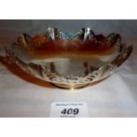 A silver pedestal dish with pierced deco