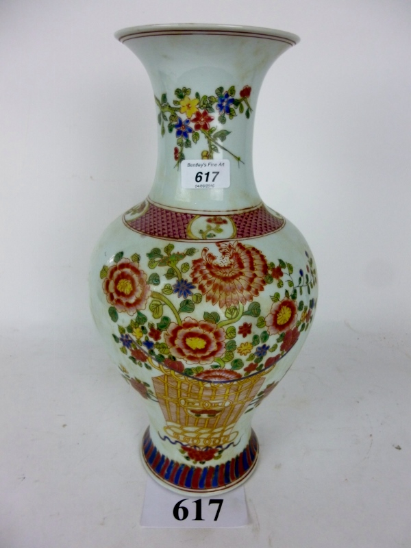 A Chinese baluster vase decorated with a