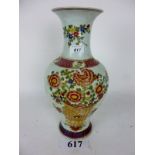 A Chinese baluster vase decorated with a