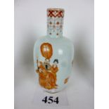 A Chinese vase painted with figures in r