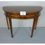 A 19c mahogany demi lune hall table with