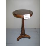 A 19c possibly rosewood wine/lamp table