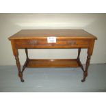 An Edwardian walnut two drawer side tabl