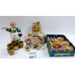 A novelty whisky decanter with five tot barrels, a Doll's Wee Tots Tea set,