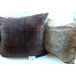 Two large cushions made from old rugs and backed with velvet,