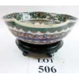 A Japanese fluted bowl decorated with dragon and landscape in the Satsuma style on wooden stand (2)