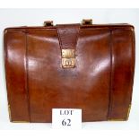 An old leather brief case est: £25-£45 (G3)