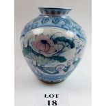 A Chinese bulbous blue and white vase with poly chrome duck and lily pad decoration est: £20-£40