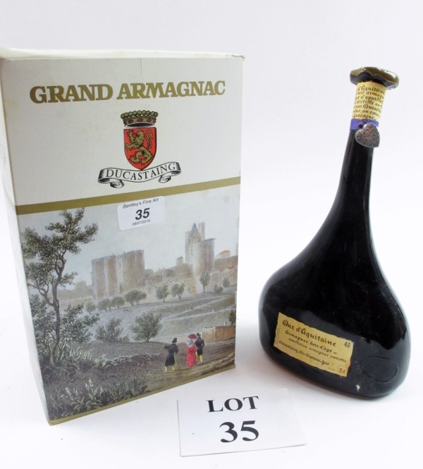 A bottle of Grand Armagnac Hors d' Age est: £100-£200 (A2)