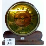A large mahogany mantle clock,