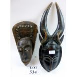 A Yaoure African carved tribal mask and another (2) est: £20-£40