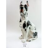 A large figurine of a dog est: £25-£40 (A2)