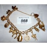 A 9ct gold charm bracelet with 12 various charms est: £260-£380