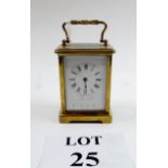 A French brass carriage clock with key est: £45-£65 (G2)