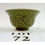 A Chinese green glazed bowl with relief moulded dragon decoration est: £70-£90 (B12)