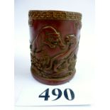 An Oriental red brush pot decorated with tigers est: £50-£80 (B2)