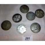 A collection of seven Chinese coins est: £30-£40