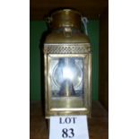 A brass lantern signed E.G.