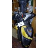 A set of golf clubs in golf bag, to include Slazenzer,