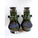 An impressive, large pair of cloisonné baluster vases, with geometric and dragon head design,
