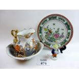 A large decorative Chinese Famille rose type plate and stand together with a toilet jug and basin