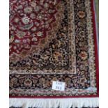 Red ground Keshan motif carpet (2.30 x 1.