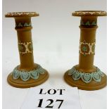 A pair of Doulton Silicon ware candlesticks est: £15-£25 (B21)